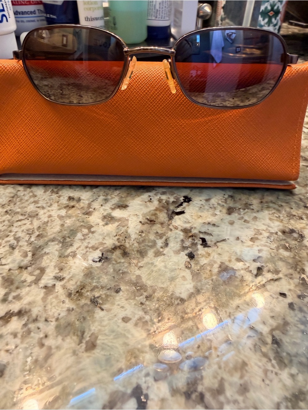 Classic Brown-Tinted Sunglasses with Orange Case